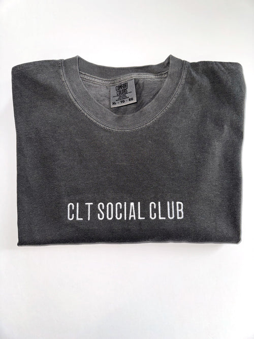 CLT Social Club embroidered tee in Pepper, folded with the collar showing