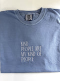 "Kind people are my kind of people" embroidered tee in Blue Jean, folded flat with the collar showing