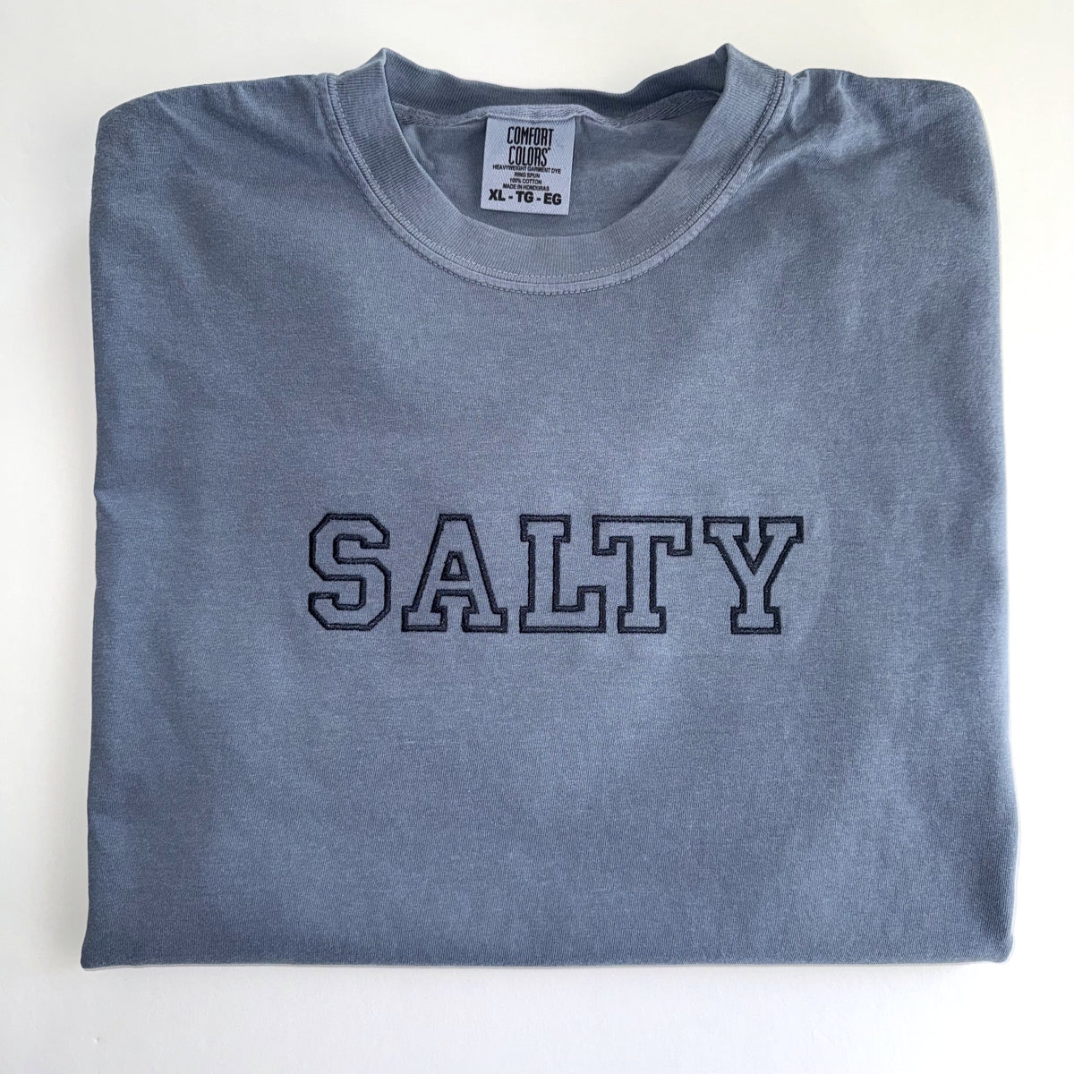 Salty embroidered tee in Blue Jean with navy outline lettering