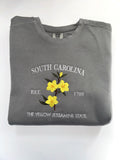 South Carolina Yellow Jessamine embroidered crewneck in Pepper, folded with the collar showing